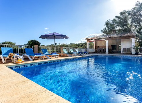 Solarium zum Sonnenbaden inmitten der Natur und zum Entspannen am Pool